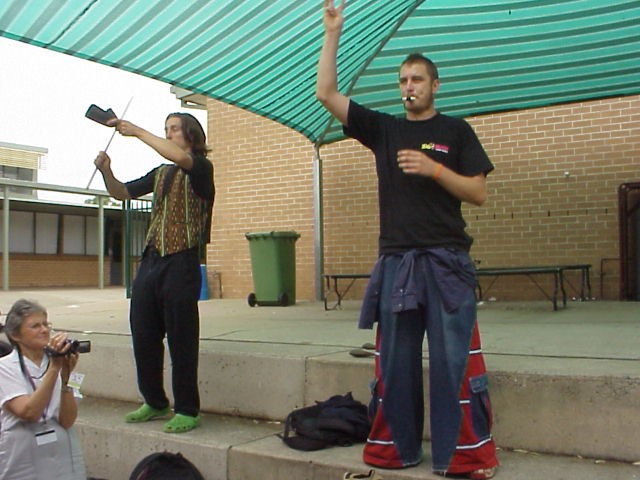 Facilitators in front of a crowd